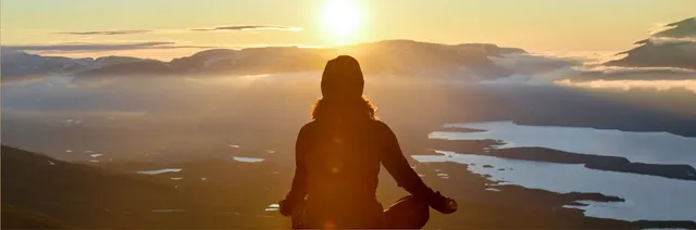 Midnight sun over Lake Torneträsk in Abisko, a symbol of longevity and healthy years