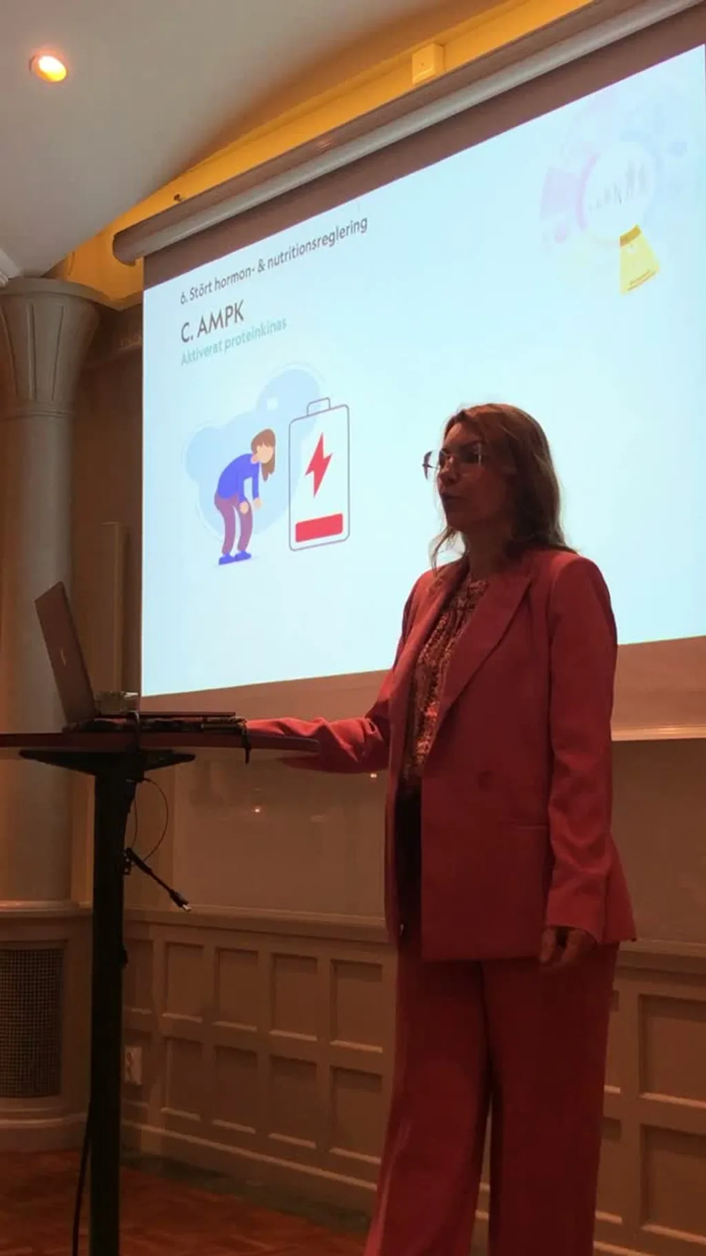 Dr Nathalie Helm lecturing on AMPK and the Hallmarks of Aging